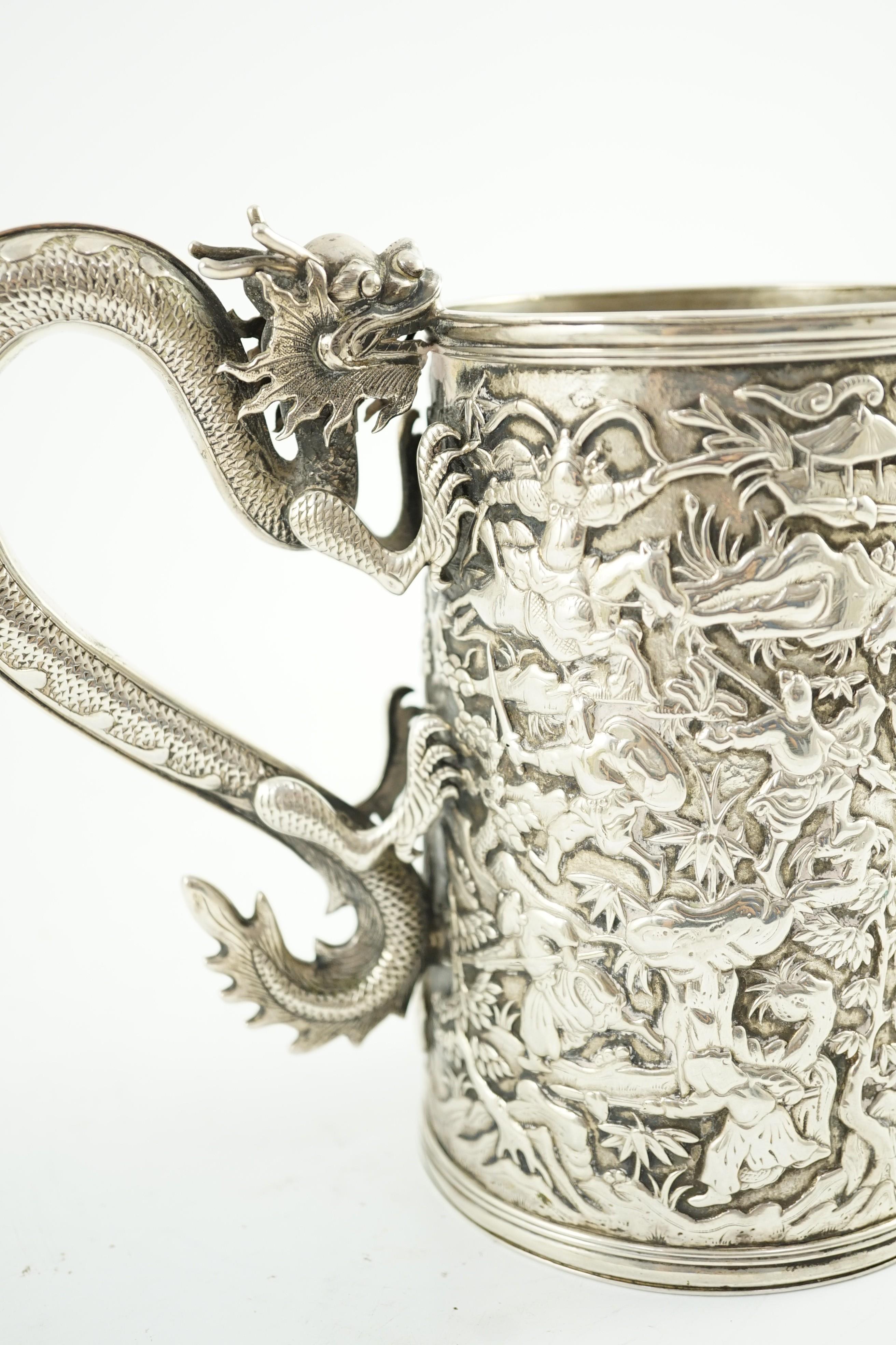 A late 19th century Chinese Export double skinned silver mug, by Leeching?